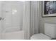 Clean, bright bathroom featuring a standard tub and shower combination with a decorative curtain at 307 Morning Marsh Ln, Charleston, SC 29492