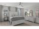 Bright bedroom featuring neutral décor, with large windows and a ceiling fan at 307 Morning Marsh Ln, Charleston, SC 29492