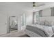 Cozy bedroom showcasing a bed, dresser, and a mirror, creating a comfortable retreat at 307 Morning Marsh Ln, Charleston, SC 29492
