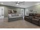 Inviting living room featuring a ceiling fan, modern furnishings, and a rear exterior door at 307 Morning Marsh Ln, Charleston, SC 29492