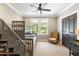 Bedroom with bunk beds, a ceiling fan, and a view of the outdoors through a window at 3125 Privateer Creek Rd, Seabrook Island, SC 29455