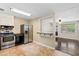 Kitchen featuring white cabinets, stainless steel appliances, and tile flooring at 3284 Sassy Dr, Johns Island, SC 29455