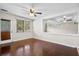 Living room featuring a ceiling fan and gleaming hardwood floors at 3284 Sassy Dr, Johns Island, SC 29455