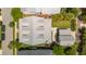 A lovely home is surrounded by lush greenery, creating a serene and private setting at 371 Bridgetown Pass, Mount Pleasant, SC 29464