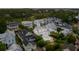 Scenic aerial view highlights a neighborhood nestled among trees and waterways, showcasing well-maintained properties and lush greenery at 371 Bridgetown Pass, Mount Pleasant, SC 29464