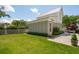 Lush backyard with well-manicured lawn and charming architecture at 371 Bridgetown Pass, Mount Pleasant, SC 29464