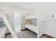 bedroom featuring white bunk beds, a ceiling fan, and bright rug at 371 Bridgetown Pass, Mount Pleasant, SC 29464