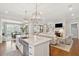 Open kitchen design with a large island and seamless flow into the adjacent living areas at 371 Bridgetown Pass, Mount Pleasant, SC 29464
