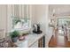 Close-up of countertop with tasteful decor and a window that lets in ample natural light at 371 Bridgetown Pass, Mount Pleasant, SC 29464