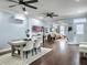 Dining area flows from kitchen and living area with modern table and decor at 4 Line St, Charleston, SC 29403