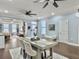 Bright and airy living area with an open floor plan and multiple ceiling fans at 4 Line St, Charleston, SC 29403