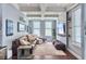 Bright living room with modern decor, including a comfortable sofa, accent pillows, and a stylish entertainment center at 4 Line St, Charleston, SC 29403