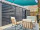 Cozy outdoor patio with shade cover, comfortable seating, and stylish decor at 4 Line St, Charleston, SC 29403