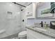 Elegant bathroom showcases a tiled shower, updated fixtures, and vanity with granite countertop at 402 Woodward Blvd, Summerville, SC 29483