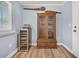 Stylish dining area features a wine cooler and custom shelving at 402 Woodward Blvd, Summerville, SC 29483