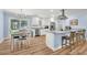 Modern kitchen with stainless steel appliances, granite countertops, island with seating, and breakfast nook at 402 Woodward Blvd, Summerville, SC 29483