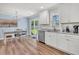 Contemporary kitchen with stainless steel appliances, granite counters, and access to dining area at 402 Woodward Blvd, Summerville, SC 29483