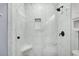 Contemporary bathroom featuring a walk-in shower with marble style tile and niche at 402 Woodward Blvd, Summerville, SC 29483