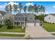 Charming two-story home with a three-car garage and a welcoming front porch at 443 Coopers Hawk Dr, Summerville, SC 29483