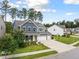 Charming two-story home with a three-car garage and a welcoming front porch at 443 Coopers Hawk Dr, Summerville, SC 29483