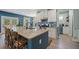 Open kitchen with granite countertops, white cabinetry, and stainless steel appliances at 443 Coopers Hawk Dr, Summerville, SC 29483
