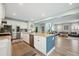Bright, open kitchen with large island, stainless steel appliances, and lots of counter space at 443 Coopers Hawk Dr, Summerville, SC 29483