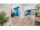 Bright, open living area with hardwood floors and a cozy fireplace at 443 Coopers Hawk Dr, Summerville, SC 29483