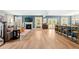 Spacious living area boasts a fireplace, an entertainment area, and a kitchen island with barstool seating at 443 Coopers Hawk Dr, Summerville, SC 29483