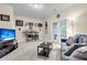 Finished basement with bar, TV area, and walkout to the yard at 4630 Palm View Cir, North Charleston, SC 29418