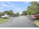 A community boat storage area with multiple spaces and covered boats ensures easy access to waterfront adventures at 4630 Palm View Cir, North Charleston, SC 29418