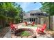 Outdoor fire pit and patio furniture creates a relaxing backyard setting for outdoor gatherings at 4752 Trailside Ct # B, North Charleston, SC 29418