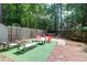 The backyard with a hammock and patio furniture makes for a great space for outdoor relaxation and entertainment at 4752 Trailside Ct # B, North Charleston, SC 29418