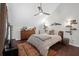 Modern bedroom with ceiling fan, natural light and wooden dresser at 4752 Trailside Ct # B, North Charleston, SC 29418