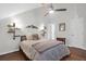 A spacious bedroom features a vaulted ceiling with a modern ceiling fan, creating a bright and airy ambiance at 4752 Trailside Ct # B, North Charleston, SC 29418
