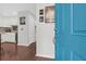 Bright foyer with a view of the updated kitchen and beautiful hardwood floors at 4752 Trailside Ct # B, North Charleston, SC 29418