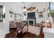 Cozy living room features a fireplace, neutral tones, and vaulted ceiling at 4752 Trailside Ct # B, North Charleston, SC 29418