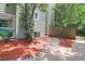 A well-maintained side yard with a stone path, and mature shrubbery adds curb appeal at 4752 Trailside Ct # B, North Charleston, SC 29418