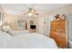Bright bedroom features twin beds, closet with mirrored doors, and storage drawers at 4856 Green Dolphin Way # Share 5, Kiawah Island, SC 29455