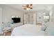 Bedroom features white furniture, ceiling fan, and view into bathroom at 4856 Green Dolphin Way # Share 5, Kiawah Island, SC 29455