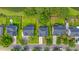 Aerial view of homes with well-maintained lawns, driveways, and tree-lined streets, showcasing suburban living at 5256 Mulholland Dr, Summerville, SC 29485