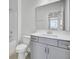 Bathroom features a shower, toilet, and vanity with sink and storage at 528 Fern Tree Dr, Summerville, SC 29486