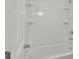 Bathroom with a white tub and shower combination with built-in shelving at 528 Fern Tree Dr, Summerville, SC 29486