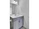 A half bathroom featuring vanity with sink, storage, and a mirror at 528 Fern Tree Dr, Summerville, SC 29486