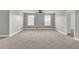 Spacious bedroom featuring plush carpeting, neutral walls, abundant natural light, and open floor plan at 528 Fern Tree Dr, Summerville, SC 29486