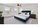 Bright bedroom with large windows, a plush bed, and a contemporary rug at 528 Fern Tree Dr, Summerville, SC 29486