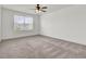 Light and airy bedroom with neutral carpet, ceiling fan, and a large window at 528 Fern Tree Dr, Summerville, SC 29486
