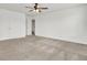 Expansive bedroom featuring neutral carpet, a ceiling fan, and access to a bathroom at 528 Fern Tree Dr, Summerville, SC 29486
