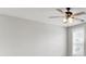 Bright bedroom with ceiling fan, window, and neutral paint perfect to add your personal touch at 528 Fern Tree Dr, Summerville, SC 29486