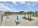 Bright and spacious pool area with chairs and tables at 528 Fern Tree Dr, Summerville, SC 29486