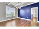 Charming dining area with a modern chandelier, large window, and adjacent to the kitchen at 528 Fern Tree Dr, Summerville, SC 29486